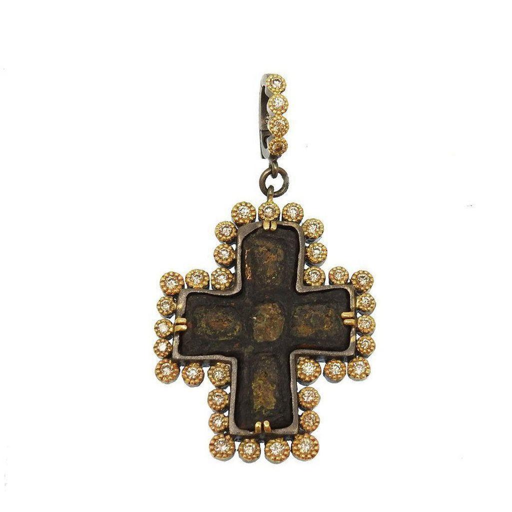 Ancient Cross with Beaded Diamond Bezel pendant: Antique bronze cross framed by shimmering diamonds.