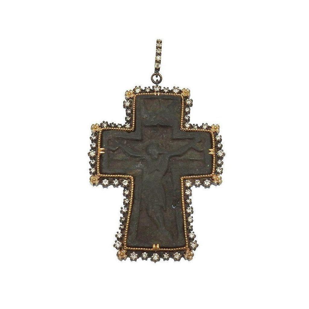 Ancient Russian cross pendant with diamond bezel; dark metal, detailed crucifix.