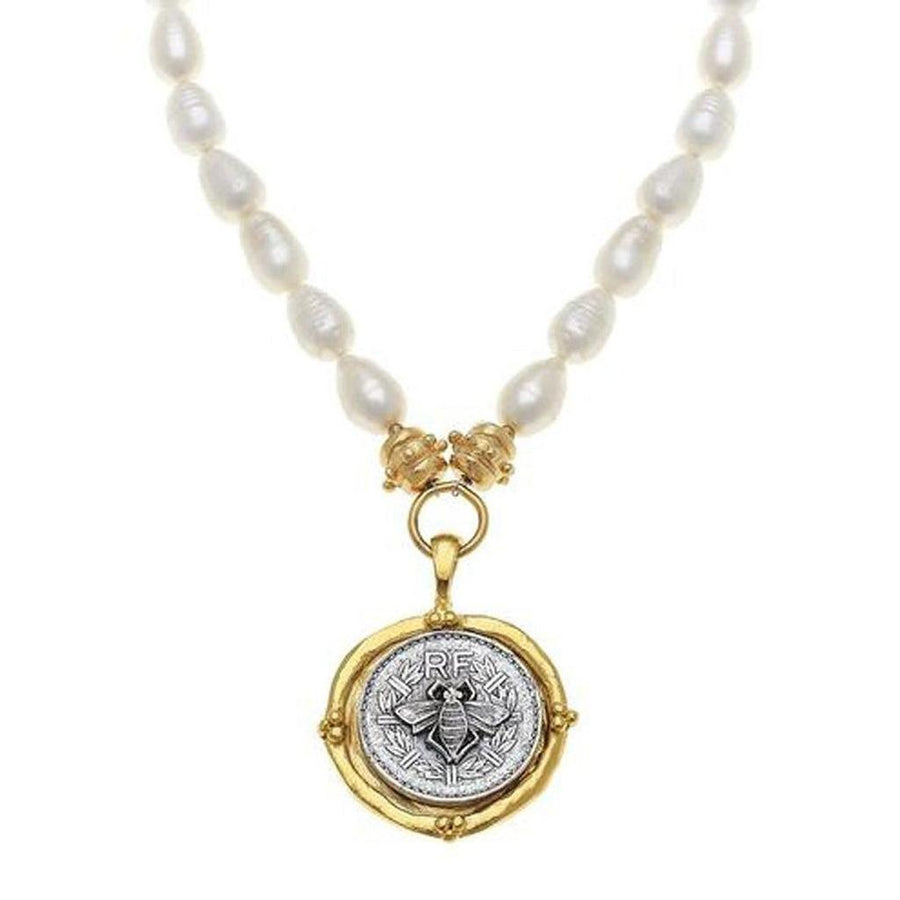 Bee Coin Pendant Necklace: Gold & silver bee coin pendant on a delicate pearl strand.