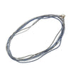 Multi-strand Cassandra necklace with ombre blue and gray crystals.