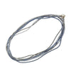 Multi-strand Cassandra necklace with ombre blue and gray crystals.