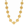 Gold coin necklace with embossed detailing and tiny diamonds.