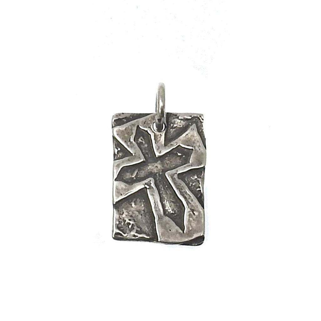 Silver cross pendant, rectangular, textured design.