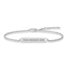 Engravable silver bar bracelet with delicate chain, personalized message.