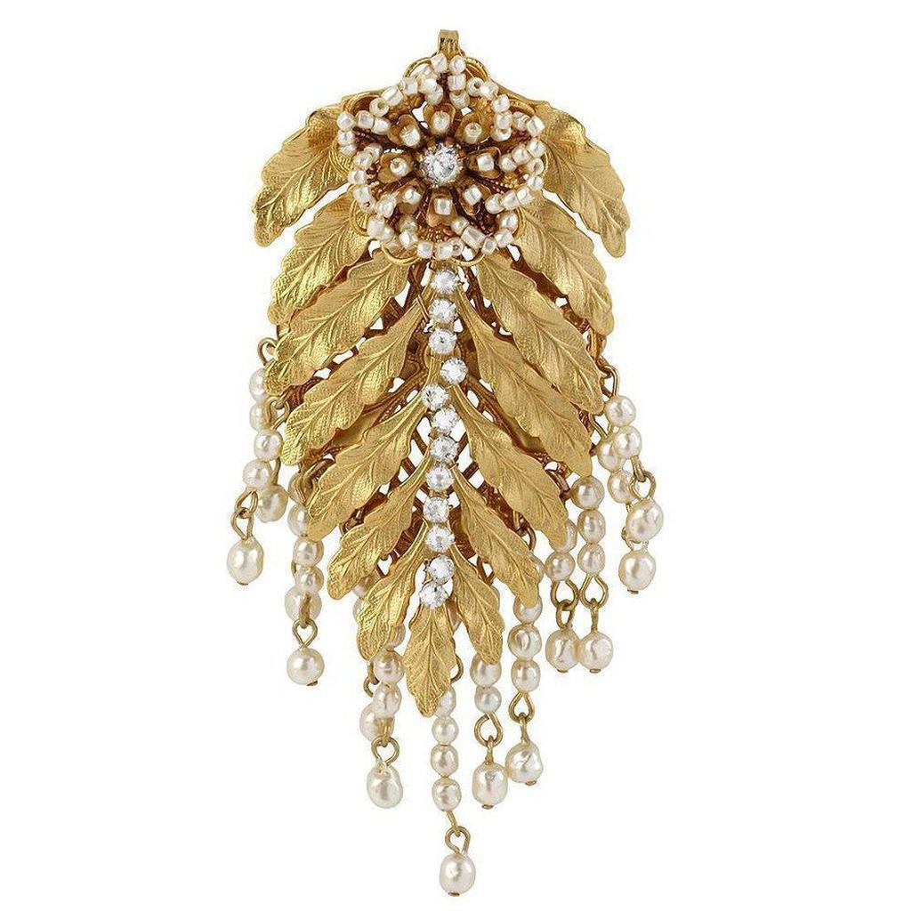 Gold Fern Pearl brooch with dazzling clear stones and delicate pearl accents.