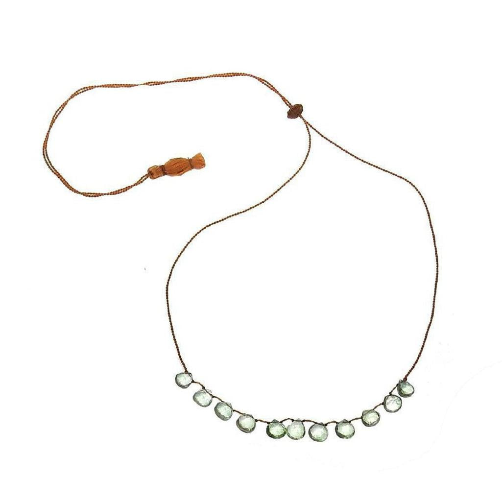 Floating Green Quartz Tassel Necklace, light green gemstones on brown cord.