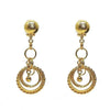Gold link chandelier clip earrings with textured ball tops and layered circle accents.