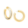 Gold medium hoop earrings; bold statement jewelry.
