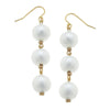 Handcast Gold Cotton Pearl Drop Earrings: Elegant white pearl and gold drop earrings.