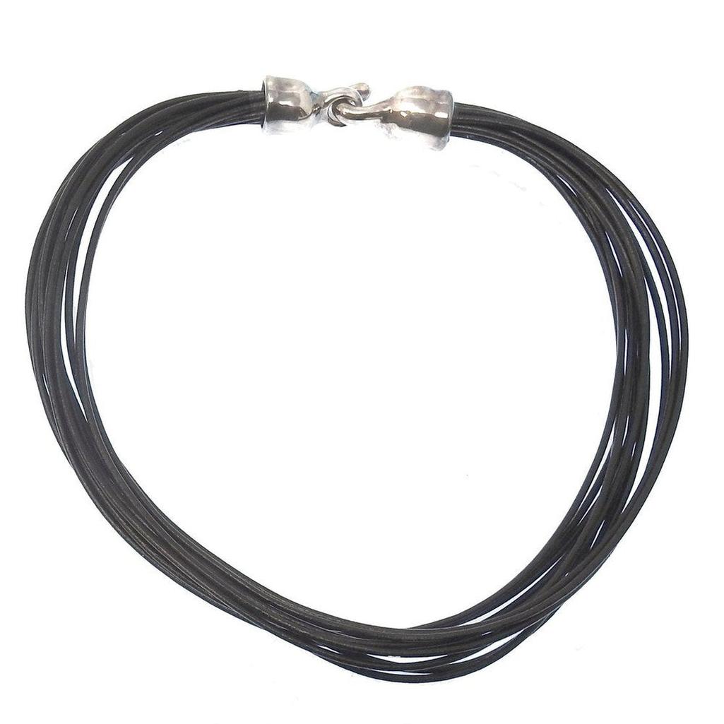 Multi-strand black leather necklace with silver clasp.