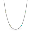 36-inch oxidized sterling silver chain featuring stationed turquoise stones set in 18k gold accents.