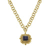 24k gold-plated London pendant necklace featuring a square dark crystal stone on a textured gold link chain.