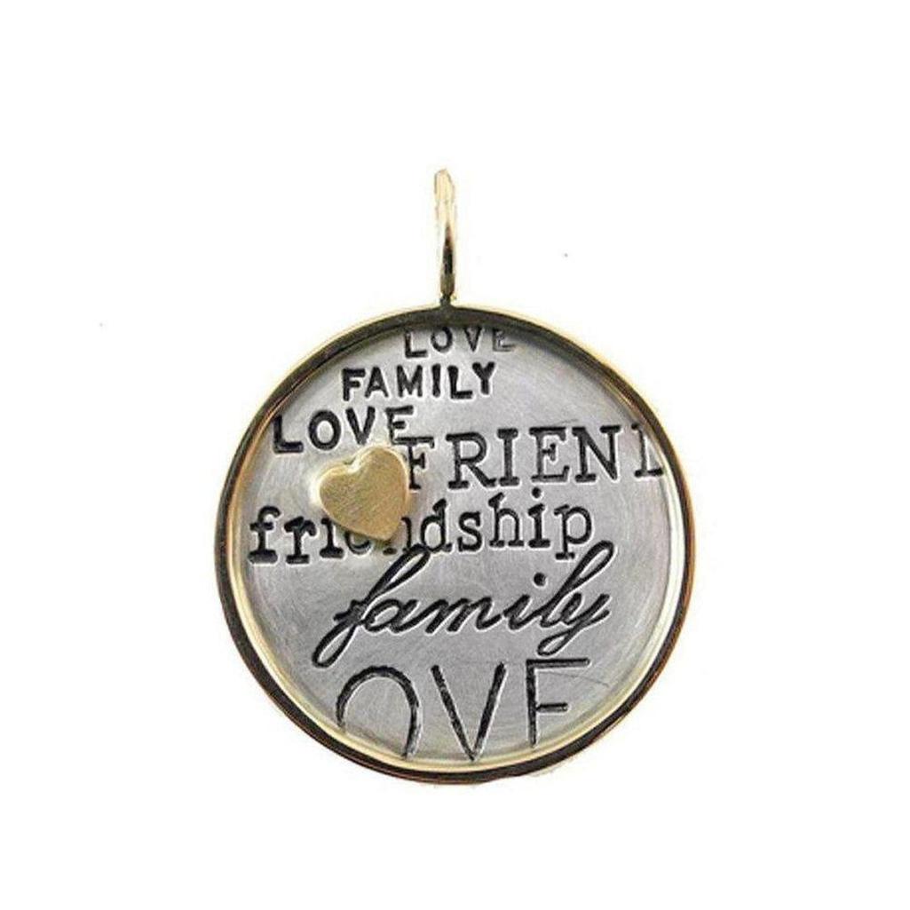 Silver and gold Love Family pendant with engraved words "love family friendship" and small gold heart charm.