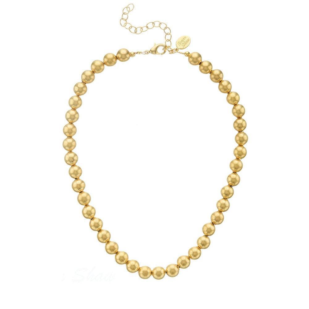 Mini Margaret gold bead necklace; elegant, gold-tone, matte finish.