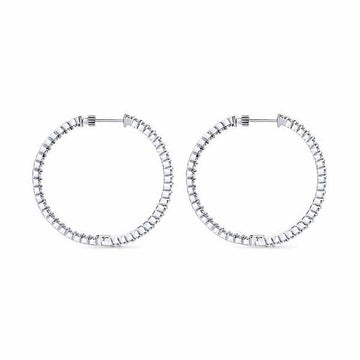 Diamond-encrusted 1-inch hoops; elegant, classic design.
