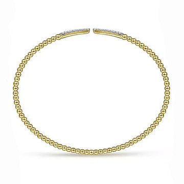 14K gold beaded cuff bracelet featuring diamond pave accents.
