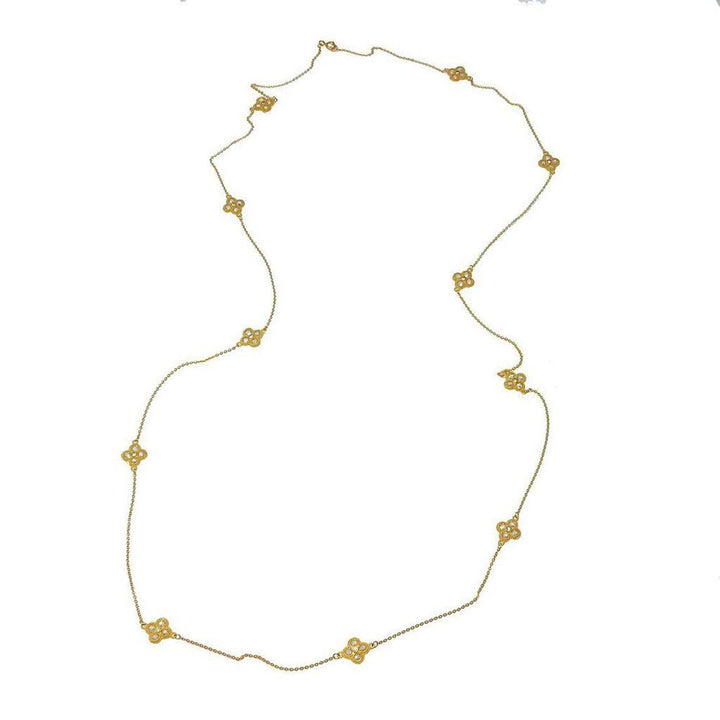 36-inch gold necklace with floral accents and small stones.
