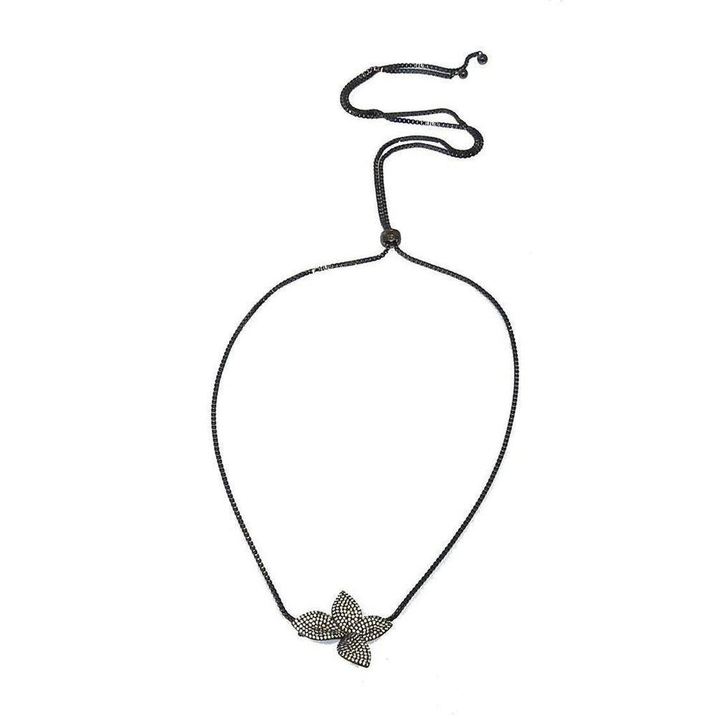 Adjustable flower slide necklace with black chain and pave diamond flower pendant.
