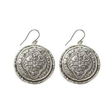 Alcazar silver coin hook earrings with ornate detailing.
