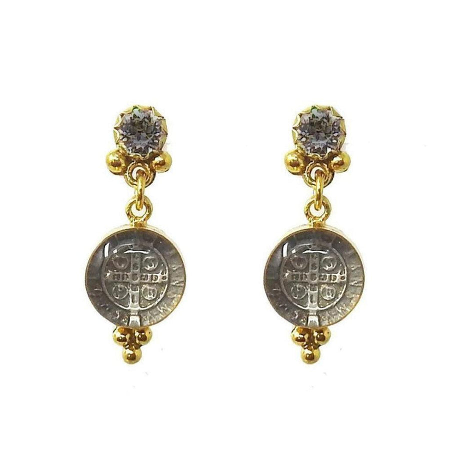 Gold drop earrings featuring clear glass medallions with silver-toned religious charms and clear cubic zirconia accents.
