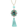 Amethyst & Turquoise Tassel Necklace:  Gold chain, large emerald green gemstone, purple & green accents, turquoise tassel.
