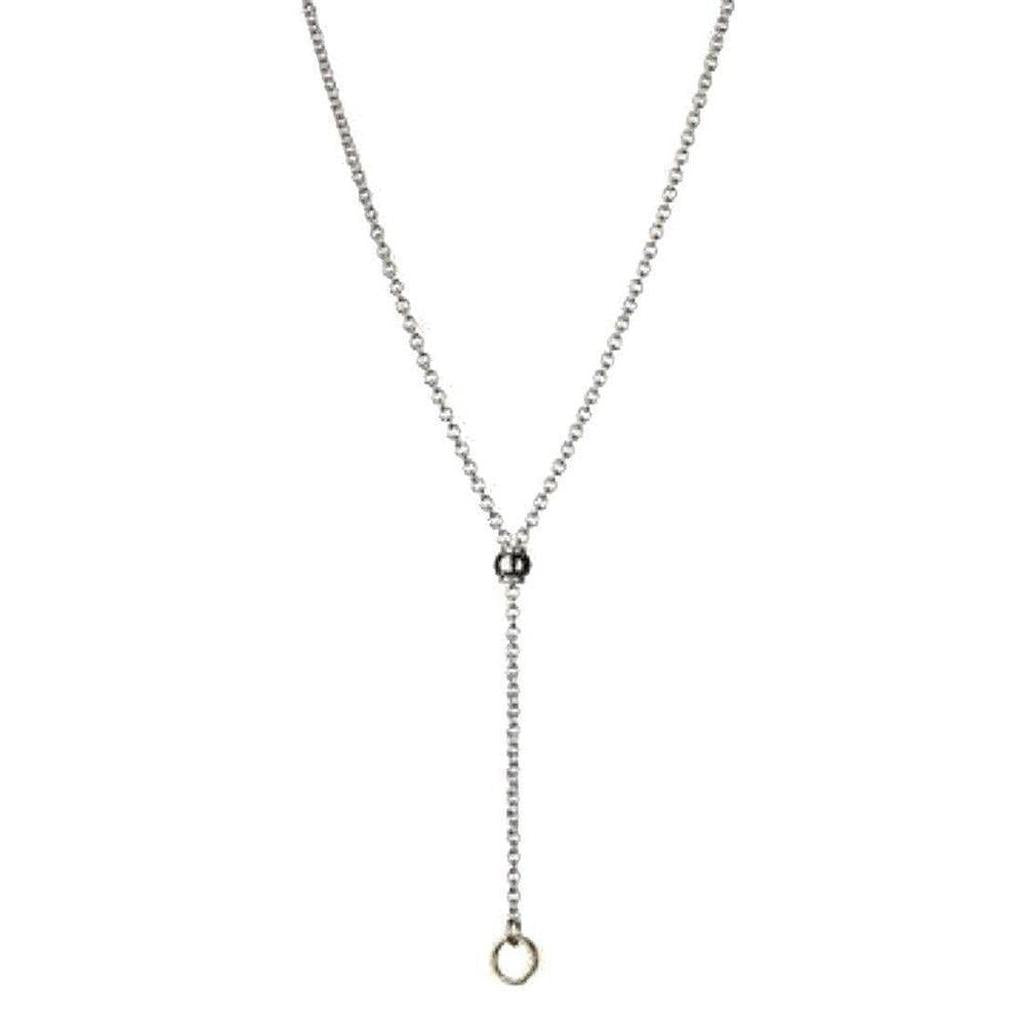 Anthology Chain: Elegant silver chain necklace with a dark bead and gold ring detail.
