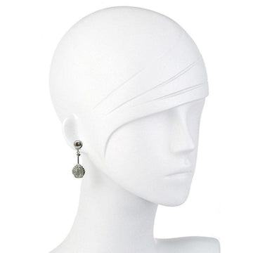 Silver basketweave dangle earrings on a mannequin.
