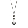 Black Diamond Rhodium Drop necklace: elegant, long chain with three clear crystal accents.
