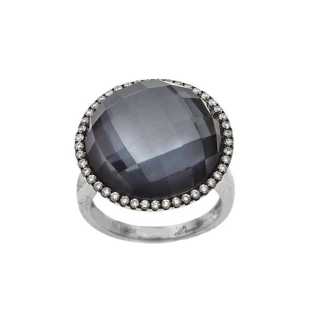 Dark gray mother-of-pearl statement ring, encircled by sparkling diamonds.
