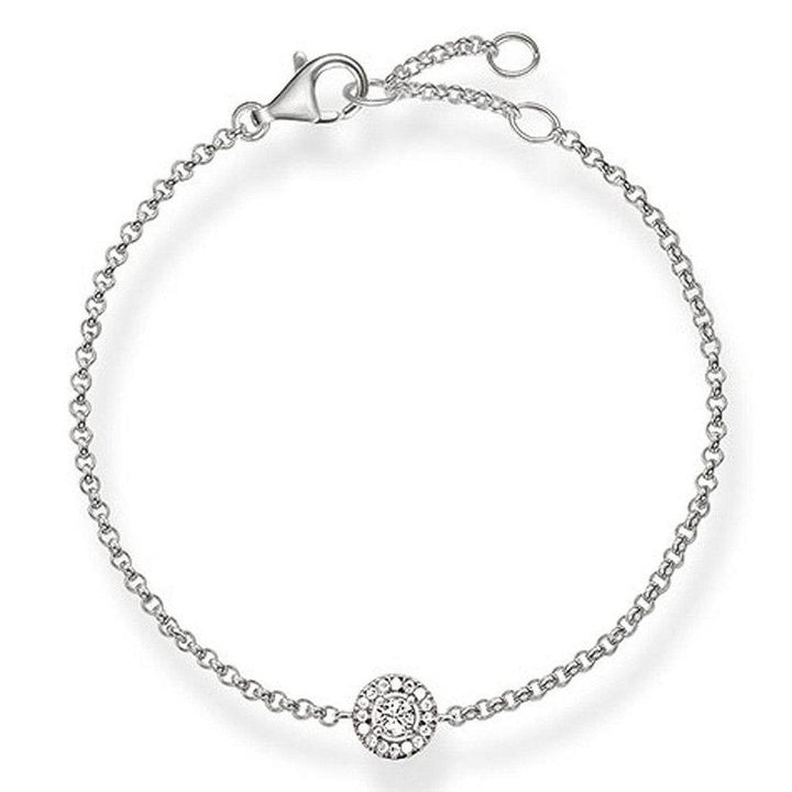Silver chain bracelet with a central diamond halo pendant.
