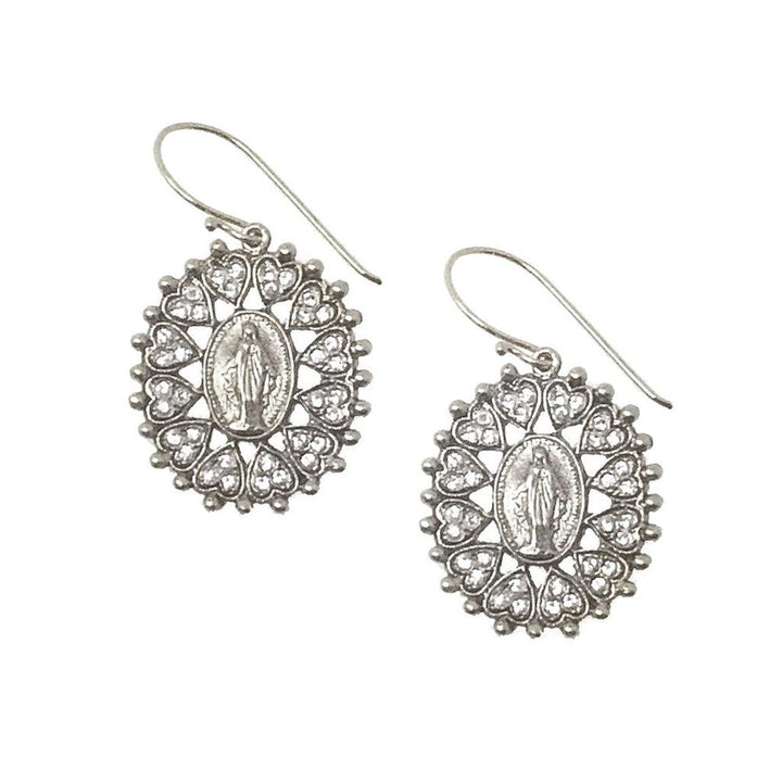 Silver earrings featuring a Virgin Mary medallion, encircled by clear cubic zirconia hearts.
