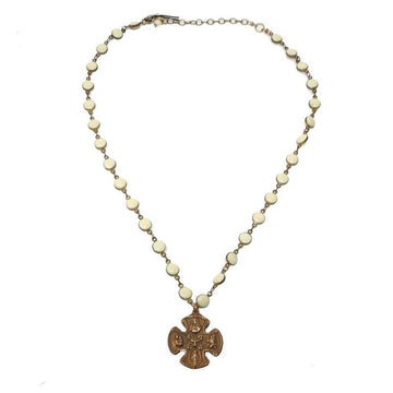 Bronze cross pendant necklace with creamy white beads.

