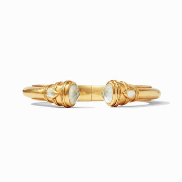 Gold cuff bracelet with milky quartz gemstones and detailed accents.
