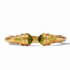 Gold Cannes Demi Hinge Cuff with green gemstones.
