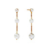 Cascade Pearl Earrings: Elegant gold chain drop earrings featuring three lustrous white pearls.
