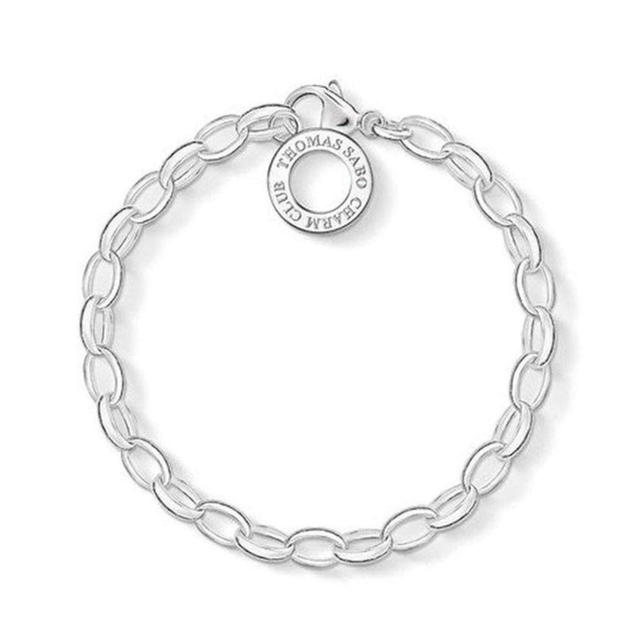 Sterling silver Charm Club bracelet by Thomas Sabo, featuring an oval-link chain and engraved charm.

