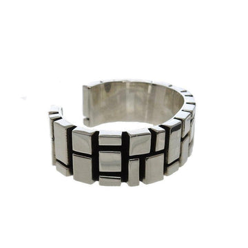 Sterling silver cuff bracelet with geometric design.
