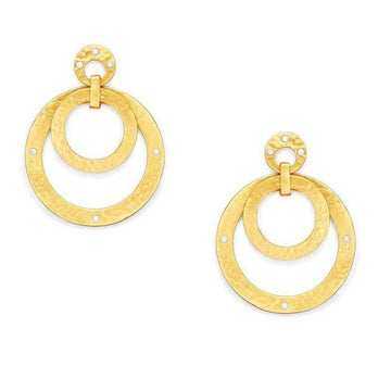 Gold statement earrings; double hammered circles with small stones.
