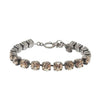 Iridescent blush crystal tennis bracelet with oxidized silver chain.
