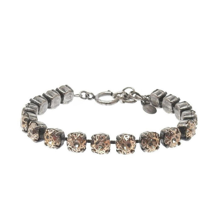 Iridescent blush crystal tennis bracelet with oxidized silver chain.
