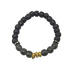 Black and gray beaded bracelet with gold accents.
