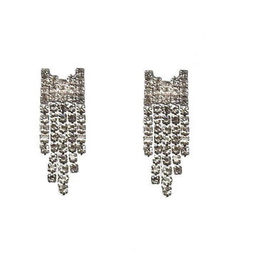 Silver rhinestone drop earrings with cascading design.
