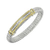 Diamond bar bracelet with gold and silver detailing, featuring a row of sparkling diamonds.
