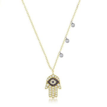 Diamond Hand of Fatima necklace with evil eye charm and three diamond accents.
