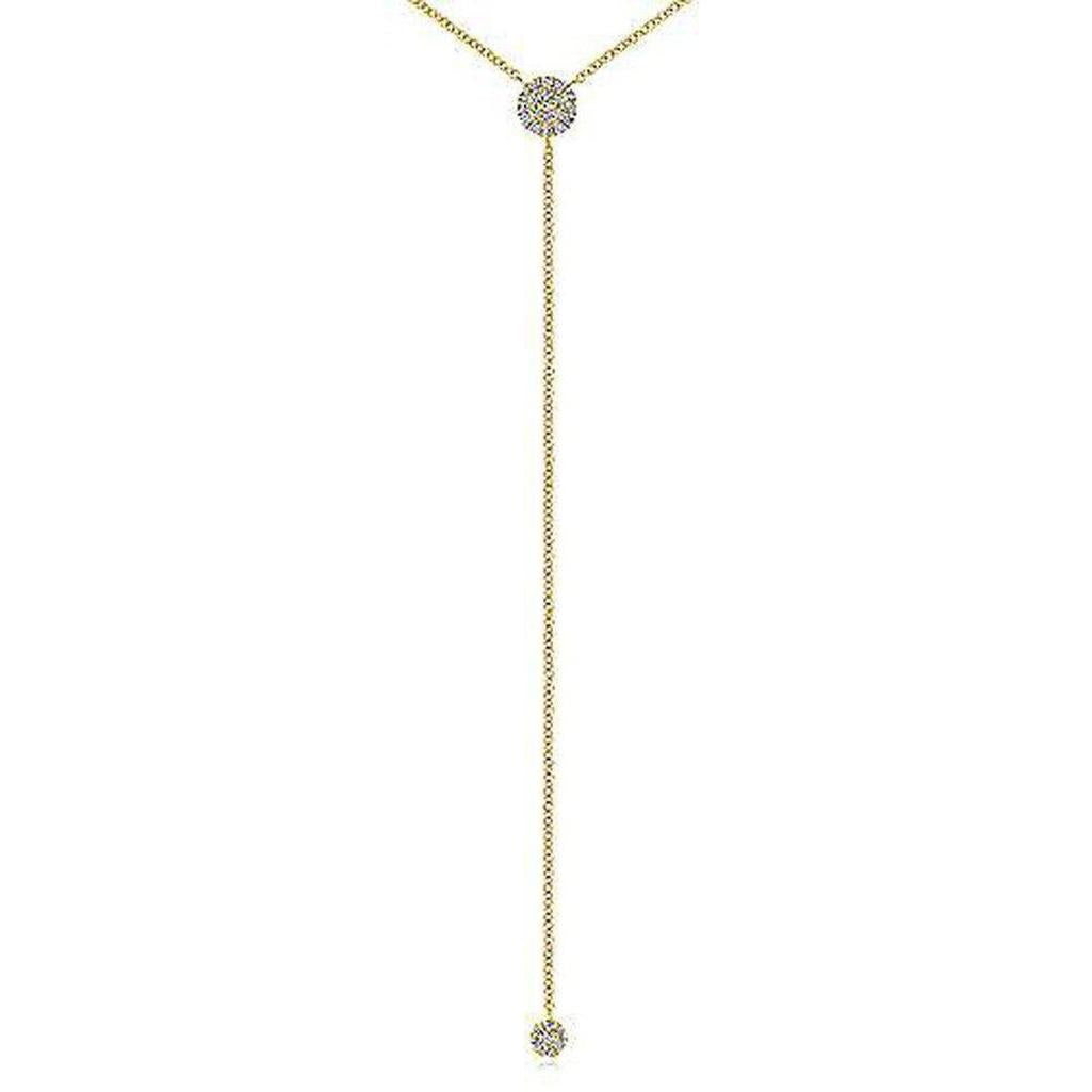 Gold diamond lariat necklace with two small pave diamond accents.
