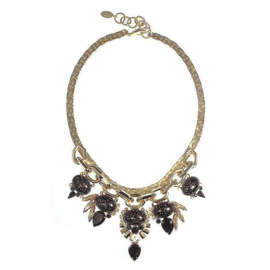 Gold chain necklace with dark stone accents; statement piece.
