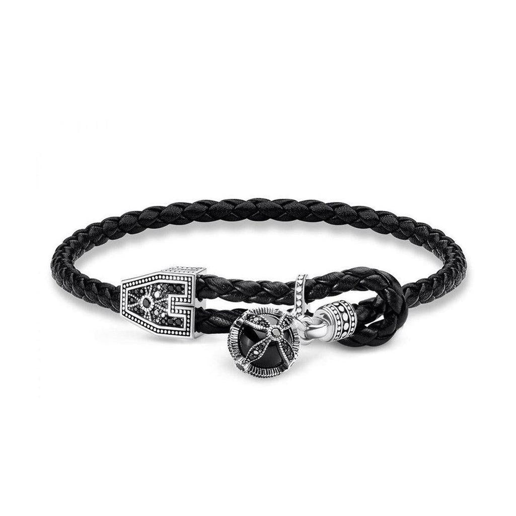 Black leather double wrap bracelet with silver ornate clasp and onyx charm.
