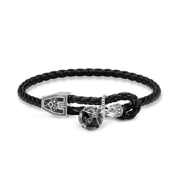 Black leather double wrap bracelet with silver ornate clasp and onyx charm.
