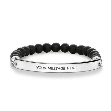 Black obsidian beaded bracelet with personalized silver bar.
