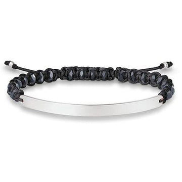 Engravable macrame bracelet with black beads and silver plate
